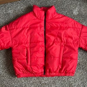 Red puffer coat